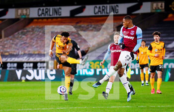2021-04-05 - Wolverhampton Wanderers forward Adama Traore (37) shot is blocked by West Ham United defender Issa Diop (23) during the English championship Premier League football match between Wolverhampton Wanderers and West Ham United on April 5, 2021 at Molineux in Wolverhampton, England - Photo Simon Davies / ProSportsImages / DPPI - WOLVERHAMPTON WANDERERS VS WEST HAM UNITED - ENGLISH PREMIER LEAGUE - SOCCER