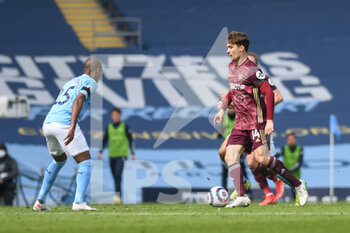 2021-04-10 - Leeds United defender Diego Llorente (14) and Fernandinho of Manchester City during the English championship Premier League football match between Manchester City and Leeds United on April 10, 2021 at the Etihad Stadium in Manchester, England - Photo Malcolm Bryce / ProSportsImages / DPPI - MANCHESTER CITY AND LEEDS UNITED - ENGLISH PREMIER LEAGUE - SOCCER