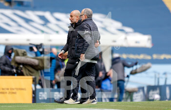 2021-04-10 - Manchester City Manager Josep Pep Guardiola and Leeds United Manager Marcelo Bielsa embrace at the final whistle during the English championship Premier League football match between Manchester City and Leeds United on April 10, 2021 at the Etihad Stadium in Manchester, England - Photo Simon Davies / ProSportsImages / DPPI - MANCHESTER CITY AND LEEDS UNITED - ENGLISH PREMIER LEAGUE - SOCCER
