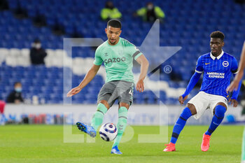 2021-04-13 - Everton defender Mason Holgate (4) and Brighton and Hove Albion midfielder Yves Bissouma (8) during the English championship Premier League football match between Brighton and Hove Albion and Everton on April 12, 2021 at the American Express Community Stadium in Brighton and Hove, England - Photo Phil Duncan / ProSportsImages / DPPI - BRIGHTON VS HOVE ALBION AND EVERTON - ENGLISH PREMIER LEAGUE - SOCCER