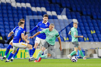 2021-04-13 - Everton striker Richarlison (7) battles with Brighton and Hove Albion midfielder Adam Lallana (14) and Brighton and Hove Albion midfielder Leandro Trossard (11) during the English championship Premier League football match between Brighton and Hove Albion and Everton on April 12, 2021 at the American Express Community Stadium in Brighton and Hove, England - Photo Phil Duncan / ProSportsImages / DPPI - BRIGHTON VS HOVE ALBION AND EVERTON - ENGLISH PREMIER LEAGUE - SOCCER