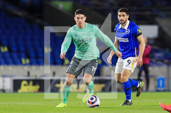 2021-04-13 - Everton striker James Rodriquez (19) and Brighton and Hove Albion forward Neal Maupay during the English championship Premier League football match between Brighton and Hove Albion and Everton on April 12, 2021 at the American Express Community Stadium in Brighton and Hove, England - Photo Phil Duncan / ProSportsImages / DPPI - BRIGHTON VS HOVE ALBION AND EVERTON - ENGLISH PREMIER LEAGUE - SOCCER