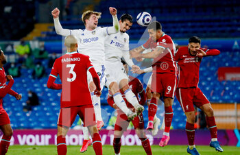 2021-04-19 - Leeds United forward Patrick Bamford (9), Leeds United defender Pascal Struijk (21) and Roberto Firmino of Liverpool during the English championship Premier League football match between Leeds United and Liverpool on April 19, 2021 at Elland Road in Leeds, England - Photo Simon Davies / ProSportsImages / DPPI - LEEDS UNITED VS LIVERPOOL - ENGLISH PREMIER LEAGUE - SOCCER