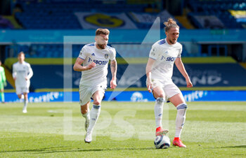2021-04-25 - Leeds United defender Stuart Dallas (15) and Leeds United defender Luke Ayling (2) during the English championship Premier League football match between Leeds United and Manchester United on April 25, 2021 at Elland Road in Leeds, England - Photo Simon Davies / ProSportsImages / DPPI - LEEDS UNITED VS MANCHESTER UNITED - ENGLISH PREMIER LEAGUE - SOCCER