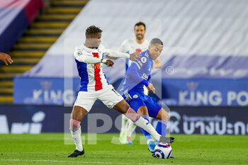 2021-04-26 - Crystal Palace forward Wilfried Zaha (11) tussles with Leicester City midfielder Youri Tielemans (8) during the English championship Premier League football match between Leicester City and Crystal Palace on April 26, 2021 at the King Power Stadium in Leicester, England - Photo Nigel Keene / ProSportsImages / DPPI - LEICESTER CITY VS CRYSTAL PALACE - ENGLISH PREMIER LEAGUE - SOCCER