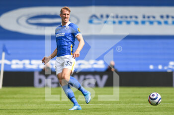 2021-05-01 - Brighton and Hove Albion defender Dan Burn during the English championship Premier League football match between Brighton and Hove Albion and Leeds United on May 1, 2021 at the American Express Community Stadium in Brighton and Hove, England - Photo Malcolm Bryce / ProSportsImages / DPPI - BRIGHTON AND HOVE ALBION VS LEEDS UNITED - ENGLISH PREMIER LEAGUE - SOCCER