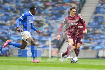 2021-05-01 - Leeds United defender Diego Llorente (14) and Brighton and Hove Albion forward Danny Welbeck (18) during the English championship Premier League football match between Brighton and Hove Albion and Leeds United on May 1, 2021 at the American Express Community Stadium in Brighton and Hove, England - Photo Malcolm Bryce / ProSportsImages / DPPI - BRIGHTON AND HOVE ALBION VS LEEDS UNITED - ENGLISH PREMIER LEAGUE - SOCCER