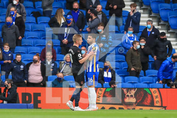 2021-05-18 - Manchester City defender Oleksandr Zinchenko (11) with Brighton and Hove Albion forward Alireza Jahanbakhsh Jirandeh (16) after red card during the English championship Premier League football match between Brighton and Hove Albion and Manchester City on May 18, 2021 at the American Express Community Stadium in Brighton and Hove, England - Photo Phil Duncan / ProSportsImages / DPPI - BRIGHTON AND HOVE ALBION VS MANCHESTER CITY - ENGLISH PREMIER LEAGUE - SOCCER