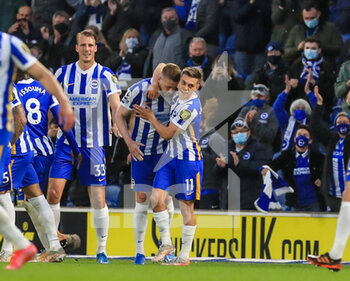 2021-05-18 - Adam Webster of Brighton and Hove Albion celebrates the 2-2 goal with Leandro Trossard during the English championship Premier League football match between Brighton and Hove Albion and Manchester City on May 18, 2021 at the American Express Community Stadium in Brighton and Hove, England - Photo Phil Duncan / ProSportsImages / DPPI - BRIGHTON AND HOVE ALBION VS MANCHESTER CITY - ENGLISH PREMIER LEAGUE - SOCCER