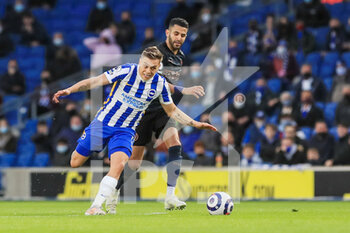 2021-05-18 - Brighton and Hove Albion midfielder Leandro Trossard (11) battles with Manchester City midfielder Riyad Mahrez (26) during the English championship Premier League football match between Brighton and Hove Albion and Manchester City on May 18, 2021 at the American Express Community Stadium in Brighton and Hove, England - Photo Phil Duncan / ProSportsImages / DPPI - BRIGHTON AND HOVE ALBION VS MANCHESTER CITY - ENGLISH PREMIER LEAGUE - SOCCER