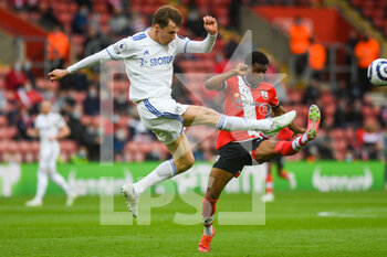 2021-05-18 - Leeds United defender Diego Llorente (14) and Southampton midfielder Nathan Tella (23) during the English championship Premier League football match between Southampton and Leeds United on May 18, 2021 at the St Mary's Stadium in Southampton, England - Photo Malcolm Bryce / ProSportsImages / DPPI - SOUTHAMPTON VS LEEDS UNITED - ENGLISH PREMIER LEAGUE - SOCCER