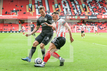 2021-05-23 - Chris Woods (9) of Burnley and Jack Robinson (19) of Sheffield United during the English championship Premier League football match between Sheffield United and Burnley on May 23, 2021 at Bramall Lane in Sheffield, England - Photo Jez Tighe / ProSportsImages / DPPI - SHEFFIELD UNITED VS BURNLEY - ENGLISH PREMIER LEAGUE - SOCCER