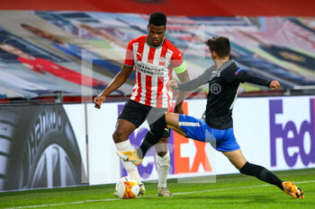 2020-10-22 - Denzel Dumfries of PSV Eindhoven, Carlos Neva of Granada during the UEFA Europa League, Group Stage, Group E football match between PSV Eindhoven and Granada CF on October 22, 2020 at Philips Stadion in Eindhoven, Netherlands - Photo Perry van de Leuvert / Orange Pictures / DPPI - PSV EINDHOVEN VS GRANADA CF - UEFA EUROPA LEAGUE - SOCCER