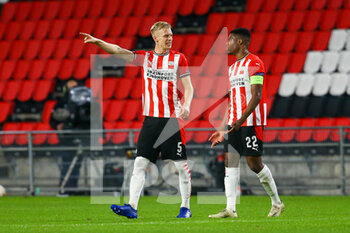 2020-10-22 - Timo Baumgartl of PSV Eindhoven, Denzel Dumfries of PSV Eindhoven during the UEFA Europa League, Group Stage, Group E football match between PSV Eindhoven and Granada CF on October 22, 2020 at Philips Stadion in Eindhoven, Netherlands - Photo Perry van de Leuvert / Orange Pictures / DPPI - PSV EINDHOVEN VS GRANADA CF - UEFA EUROPA LEAGUE - SOCCER
