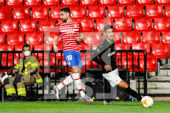 2020-10-29 - Dimitrios Giannoulis of Paok and Antonio Puertas of Granada during the UEFA Europa League, Group Stage, Group E football match between Granada CF and Paok FC on October 29, 2020 at Los Carmenes Stadium in Granada, Spain - Photo Joaquin Corchero / Spain DPPI / DPPI - GRANADA CF VS PAOK FC - UEFA EUROPA LEAGUE - SOCCER