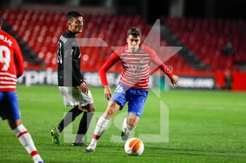 2020-10-29 - Alberto Soro of Granada and Dimitrios Giannoulis of Paok during the UEFA Europa League, Group Stage, Group E football match between Granada CF and Paok FC on October 29, 2020 at Los Carmenes Stadium in Granada, Spain - Photo Joaquin Corchero / Spain DPPI / DPPI - GRANADA CF VS PAOK FC - UEFA EUROPA LEAGUE - SOCCER