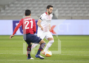 2020-11-26 - Hakan Calhanoglu of AC Milan during the UEFA Europa League, Group H football match between Lille OSC and AC Milan on November 26, 2020 at Pierre Mauroy stadium in Villeneuve-d'Ascq near Lille, France - Photo Jean Catuffe / DPPI - LILLE OSC VS AC MILAN - UEFA EUROPA LEAGUE - SOCCER