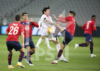 2020-11-26 - Benjamin Andre of Lille, Sandro Tonali of AC Milan, Luiz Araujo of Lille during the UEFA Europa League, Group H football match between Lille OSC and AC Milan on November 26, 2020 at Pierre Mauroy stadium in Villeneuve-d'Ascq near Lille, France - Photo Jean Catuffe / DPPI - LILLE OSC VS AC MILAN - UEFA EUROPA LEAGUE - SOCCER