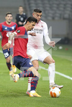 2020-11-26 - Jose Fonte of Lille, Theo Hernandez of AC Milan during the UEFA Europa League, Group H football match between Lille OSC and AC Milan on November 26, 2020 at Pierre Mauroy stadium in Villeneuve-d'Ascq near Lille, France - Photo Jean Catuffe / DPPI - LILLE OSC VS AC MILAN - UEFA EUROPA LEAGUE - SOCCER