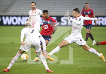 2020-11-26 - Reinildo Mandava of Lille, Diogo Dalot of AC Milan during the UEFA Europa League, Group H football match between Lille OSC and AC Milan on November 26, 2020 at Pierre Mauroy stadium in Villeneuve-d'Ascq near Lille, France - Photo Jean Catuffe / DPPI - LILLE OSC VS AC MILAN - UEFA EUROPA LEAGUE - SOCCER