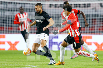 2020-11-26 - Omar El Kaddouri of PAOK, Donyell Malen of PSV during the UEFA Europa League, Group E football match between PSV and PAOK on november 26, 2020 at Philips Stadion in Eindhoven, Netherlands - Photo Perry vd Leuvert / Orange Pictures / DPPI - PSV VS PAOK - UEFA EUROPA LEAGUE - SOCCER