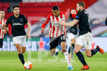 2020-11-26 - Cody Gakpo of PSV, Sverrir Ingason of PAOK during the UEFA Europa League, Group E football match between PSV and PAOK on november 26, 2020 at Philips Stadion in Eindhoven, Netherlands - Photo Perry vd Leuvert / Orange Pictures / DPPI - PSV VS PAOK - UEFA EUROPA LEAGUE - SOCCER