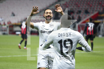 2020-12-03 - Moussa Diaby of Bayer Leverkusen celebrates his goal with Karim Bellarabi (front) during the UEFA Europa League, Group C football match between OGC Nice and Bayer Leverkusen on December 3, 2020 at Allianz Riviera stadium in Nice, France - Photo Jean Catuffe / DPPI - OGC NICE VS BAYER LEVERKUSEN - UEFA EUROPA LEAGUE - SOCCER
