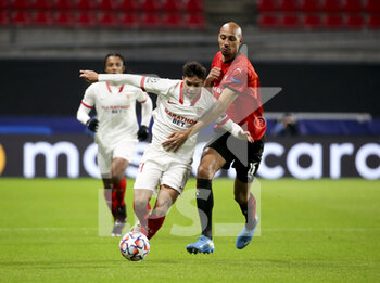 2020-12-08 - Oliver Torres of Sevilla FC, Steven Nzonzi of Stade Rennais during the UEFA Champions League, Group E football match between Stade Rennais and Sevilla FC (FC Seville) on December 8, 2020 at Roazhon Park in Rennes, France - Photo Jean Catuffe / DPPI - STADE RENNAIS VS SEVILLA FC - UEFA EUROPA LEAGUE - SOCCER