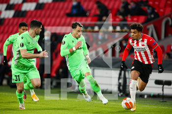 2020-12-10 - Ioannis Kousoulos of Omonia Nicosia, Vitor Gomes of Omonia Nicosia, Donyell Malen of PSV Eindhoven during the UEFA Europa League, Group E football match between PSV and Omonia Nicosia on December 10, 2020 at Philips Stadion in Eindhoven, Netherlands - Photo Perry vd Leuvert / Orange Pictures / DPPI - PSV VS OMONIA NICOSIA - UEFA EUROPA LEAGUE - SOCCER