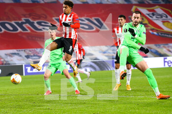 2020-12-10 - Donyell Malen of PSV Eindhoven shoots to score his sides first goal during the UEFA Europa League, Group E football match between PSV and Omonia Nicosia on December 10, 2020 at Philips Stadion in Eindhoven, Netherlands - Photo Perry vd Leuvert / Orange Pictures / DPPI - PSV VS OMONIA NICOSIA - UEFA EUROPA LEAGUE - SOCCER