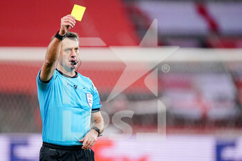2020-12-10 - Referee Alexey Kulbakov showing yellow card during the UEFA Europa League, Group D football match between Standard de Liege and SL Benfica on December 10, 2020 at Maurice Dufrasne stadium in Liege, Belgium - Photo Jeroen Meuwsen / Orange Pictures / DPPI - STANDARD DE LIEGE VS SL BENFICA - UEFA EUROPA LEAGUE - SOCCER