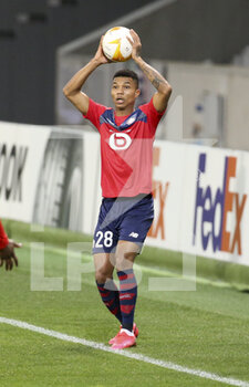 2021-02-18 - Reinildo Mandava of Lille during the UEFA Europa League, round of 32, 1st leg football match between Lille OSC (LOSC) and AFC Ajax Amsterdam on February 18, 2021 at Stade Pierre Mauroy in Villeneuve-d'Ascq near Lille, France - Photo Jean Catuffe / DPPI - LILLE OSC (LOSC) AND AFC AJAX AMSTERDAM - UEFA EUROPA LEAGUE - SOCCER