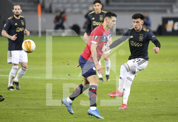2021-02-18 - Lisandro Martinez of Ajax during the UEFA Europa League, round of 32, 1st leg football match between Lille OSC (LOSC) and AFC Ajax Amsterdam on February 18, 2021 at Stade Pierre Mauroy in Villeneuve-d'Ascq near Lille, France - Photo Jean Catuffe / DPPI - LILLE OSC (LOSC) AND AFC AJAX AMSTERDAM - UEFA EUROPA LEAGUE - SOCCER