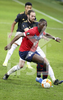2021-02-18 - Boubakary Soumare of Lille, Daley Blind of Ajax during the UEFA Europa League, round of 32, 1st leg football match between Lille OSC (LOSC) and AFC Ajax Amsterdam on February 18, 2021 at Stade Pierre Mauroy in Villeneuve-d'Ascq near Lille, France - Photo Jean Catuffe / DPPI - LILLE OSC (LOSC) AND AFC AJAX AMSTERDAM - UEFA EUROPA LEAGUE - SOCCER