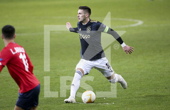 2021-02-18 - Dusan Tadic of Ajax during the UEFA Europa League, round of 32, 1st leg football match between Lille OSC (LOSC) and AFC Ajax Amsterdam on February 18, 2021 at Stade Pierre Mauroy in Villeneuve-d'Ascq near Lille, France - Photo Jean Catuffe / DPPI - LILLE OSC (LOSC) AND AFC AJAX AMSTERDAM - UEFA EUROPA LEAGUE - SOCCER