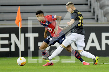 2021-02-18 - Reinildo of Lille OSC, Antony of Ajax during the UEFA Europa League, round of 32, 1st leg football match between LOSC Lille and AFC Ajax on February 18, 2021 at Pierre Mauroy stadium in Villeneuve-d'Ascq near Lille, France - Photo Gerrit van Keulen / Orange Pictures / DPPI - LOSC LILLE AND AFC AJAX - UEFA EUROPA LEAGUE - SOCCER