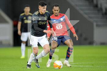 2021-02-18 - Edson Alvarez of Ajax, Renato Sanches of Lille OSC during the UEFA Europa League, round of 32, 1st leg football match between LOSC Lille and AFC Ajax on February 18, 2021 at Pierre Mauroy stadium in Villeneuve-d'Ascq near Lille, France - Photo Gerrit van Keulen / Orange Pictures / DPPI - LOSC LILLE AND AFC AJAX - UEFA EUROPA LEAGUE - SOCCER