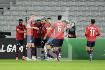 2021-02-18 - Timothy Weah of Lille OSC celebrates after the 1-0 goal with teammates during the UEFA Europa League, round of 32, 1st leg football match between LOSC Lille and AFC Ajax on February 18, 2021 at Pierre Mauroy stadium in Villeneuve-d'Ascq near Lille, France - Photo Gerrit van Keulen / Orange Pictures / DPPI - LOSC LILLE AND AFC AJAX - UEFA EUROPA LEAGUE - SOCCER