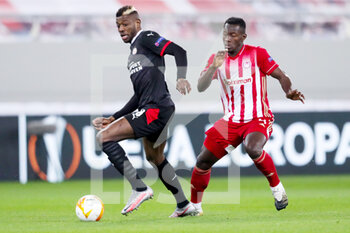 2021-02-18 - Ibrahim Sangare of PSV, Mohamed Camara of Olympiacos during the UEFA Europa League, round of 32, 1st leg football match between Olympiacos and PSV on February 18, 2021 at Stadio Georgios Karaiskakis in Piraeus, Greece - Photo Lato Klodian / Orange Pictures / DPPI - OLYMPIACOS AND PSV - UEFA EUROPA LEAGUE - SOCCER