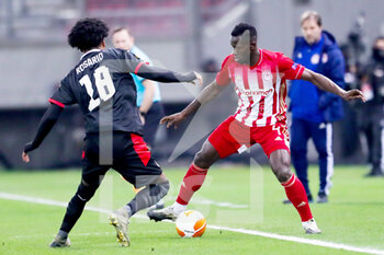 2021-02-18 - Pablo Rosario of PSV, Mohamed Camara of Olympiacos during the UEFA Europa League, round of 32, 1st leg football match between Olympiacos and PSV on February 18, 2021 at Stadio Georgios Karaiskakis in Piraeus, Greece - Photo Lato Klodian / Orange Pictures / DPPI - OLYMPIACOS AND PSV - UEFA EUROPA LEAGUE - SOCCER