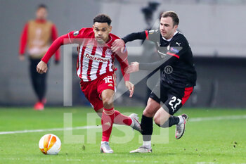 2021-02-18 - Kenny Lala of Olympiacos, Mario Gotze of PSV during the UEFA Europa League, round of 32, 1st leg football match between Olympiacos and PSV on February 18, 2021 at Stadio Georgios Karaiskakis in Piraeus, Greece - Photo Lato Klodian / Orange Pictures / DPPI - OLYMPIACOS AND PSV - UEFA EUROPA LEAGUE - SOCCER