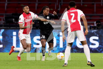 2021-02-25 - Ryan Gravenberch of Ajax, Renato Sanches of Lille OSC during the UEFA Europa League, round of 32, 2nd leg football match between Ajax and Lille OSC on February 25, 2021 at Johan Cruijf Arena in Amsterdam, Netherlands - Photo Marcel ter Bals / Orange Pictures / DPPI - AJAX AND LILLE OSC - UEFA EUROPA LEAGUE - SOCCER