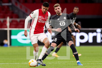 2021-02-25 - Edson Alvarez of Ajax, Xeka of Lille OSC during the UEFA Europa League, round of 32, 2nd leg football match between Ajax and Lille OSC on February 25, 2021 at Johan Cruijf Arena in Amsterdam, Netherlands - Photo Marcel ter Bals / Orange Pictures / DPPI - AJAX AND LILLE OSC - UEFA EUROPA LEAGUE - SOCCER