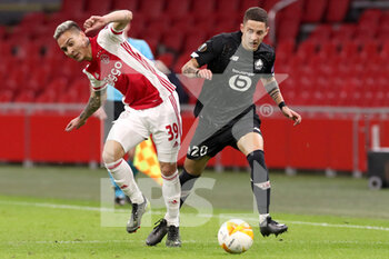 2021-02-25 - Antony of Ajax, Domagoj Bradaric of Lille OSC during the UEFA Europa League, round of 32, 2nd leg football match between Ajax and Lille OSC on February 25, 2021 at Johan Cruijf Arena in Amsterdam, Netherlands - Photo Marcel ter Bals / Orange Pictures / DPPI - AJAX AND LILLE OSC - UEFA EUROPA LEAGUE - SOCCER