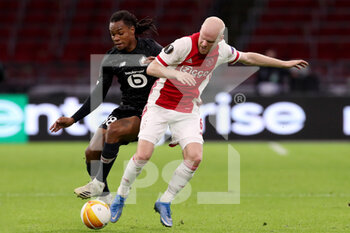 2021-02-25 - Renato Sanches of Lille OSC, Davy Klaassen of Ajax during the UEFA Europa League, round of 32, 2nd leg football match between Ajax and Lille OSC on February 25, 2021 at Johan Cruijf Arena in Amsterdam, Netherlands - Photo Marcel ter Bals / Orange Pictures / DPPI - AJAX AND LILLE OSC - UEFA EUROPA LEAGUE - SOCCER