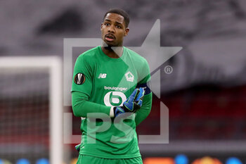 2021-02-25 - Goalkeeper Mike Maignan of Lille OSC during the UEFA Europa League, round of 32, 2nd leg football match between Ajax and Lille OSC on February 25, 2021 at Johan Cruijf Arena in Amsterdam, Netherlands - Photo Marcel ter Bals / Orange Pictures / DPPI - AJAX AND LILLE OSC - UEFA EUROPA LEAGUE - SOCCER