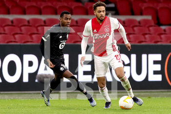 2021-02-25 - Isaac Lihadji of Lille OSC, Devyne Rensch of Ajax during the UEFA Europa League, round of 32, 2nd leg football match between Ajax and Lille OSC on February 25, 2021 at Johan Cruijf Arena in Amsterdam, Netherlands - Photo Marcel ter Bals / Orange Pictures / DPPI - AJAX AND LILLE OSC - UEFA EUROPA LEAGUE - SOCCER