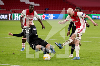 2021-02-25 - Sven Botman of Lille OSC, Davy Klaassen of Ajax during the UEFA Europa League, round of 32, 2nd leg football match between Ajax and Lille OSC on February 25, 2021 at Johan Cruijf Arena in Amsterdam, Netherlands - Photo Marcel ter Bals / Orange Pictures / DPPI - AJAX AND LILLE OSC - UEFA EUROPA LEAGUE - SOCCER