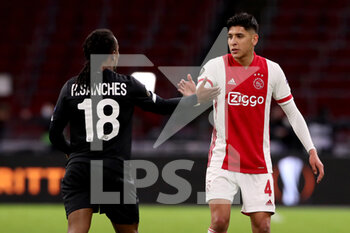 2021-02-25 - Renato Sanches of Lille OSC, Edson Alvarez of Ajax during the UEFA Europa League, round of 32, 2nd leg football match between Ajax and Lille OSC on February 25, 2021 at Johan Cruijf Arena in Amsterdam, Netherlands - Photo Marcel ter Bals / Orange Pictures / DPPI - AJAX AND LILLE OSC - UEFA EUROPA LEAGUE - SOCCER