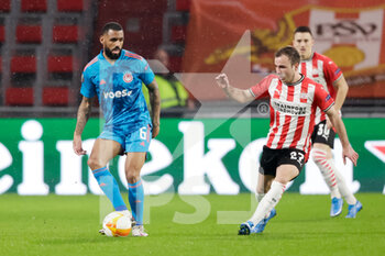 2021-02-25 - Yann M'Vila of Olympiacos and Mario Gotze of PSV during the UEFA Europa League, round of 32, 2nd leg football match between PSV and Olympiacos on February 25, 2021 at PSV Stadion in Eindhoven, Netherlands - Photo Perry van de Leuvert / Orange Pictures / DPPI - PSV AND OLYMPIACOS - UEFA EUROPA LEAGUE - SOCCER
